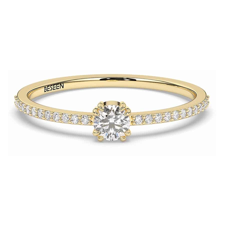 Schlichter Ring mit einem runden 0,15-karätigen Stein in der Mitte 1 Schlichter Ring mit einem runden 0,15-karätigen Stein in der Mitte